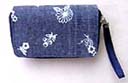 Womens beauty wear accessory supply manufacturer imports Garden flower print on navy blue makeup purse
